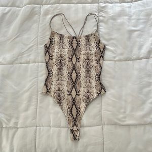 Animal print bodysuits – size P/S